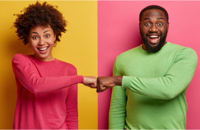 woman and woman fist bump